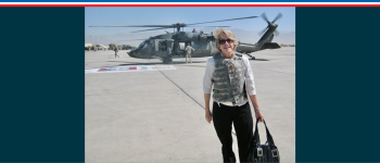 Image - the speaker with military helicopter in background