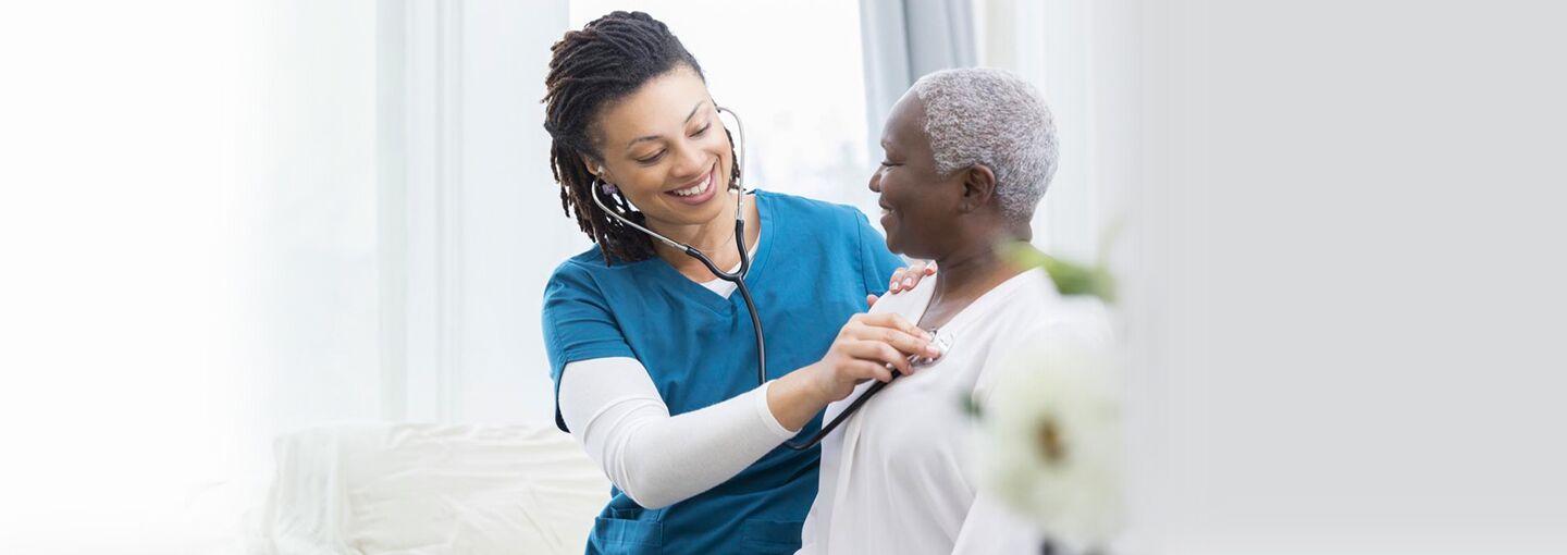 On the Frontline: Care Workers and the Pandemic Image - doctor and patient