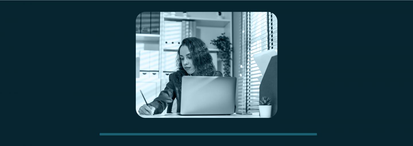 The Economic State of Latinos in America Image - woman working at desk with computer