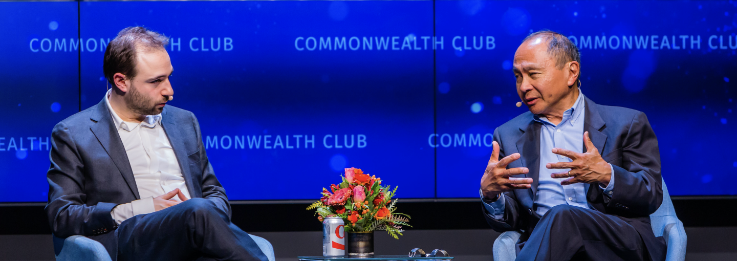 Speakers on stage in conversation at a Humanities Member-led Forum Program