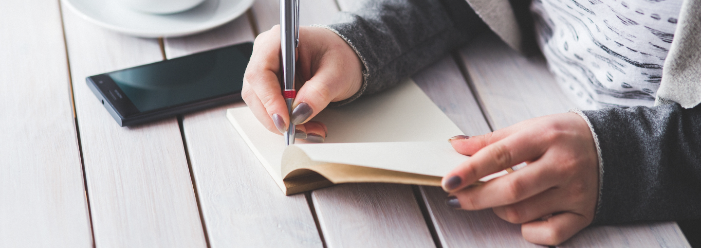 Image - woman writing in book