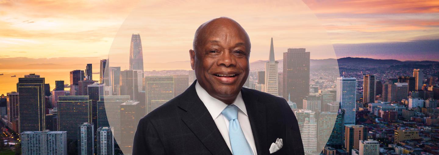The World According to Willie Brown Image - photo of speaker and background of San Francisco skyline