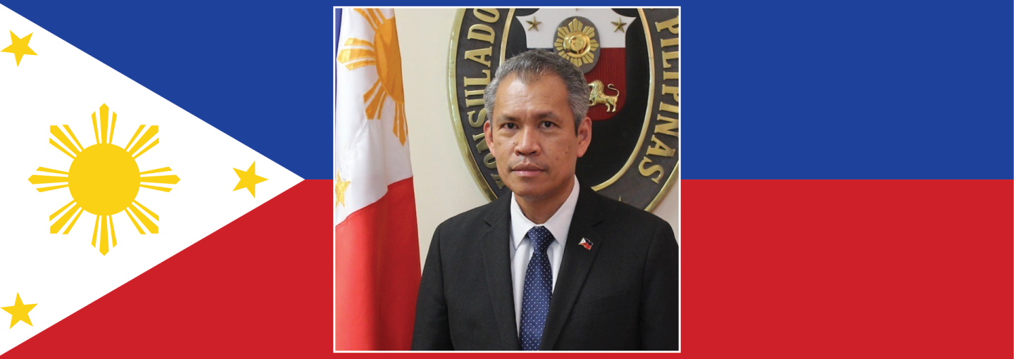 April Food Month: A Celebration of Food and Culture from the Philippines Image - the speaker and Philippine flag