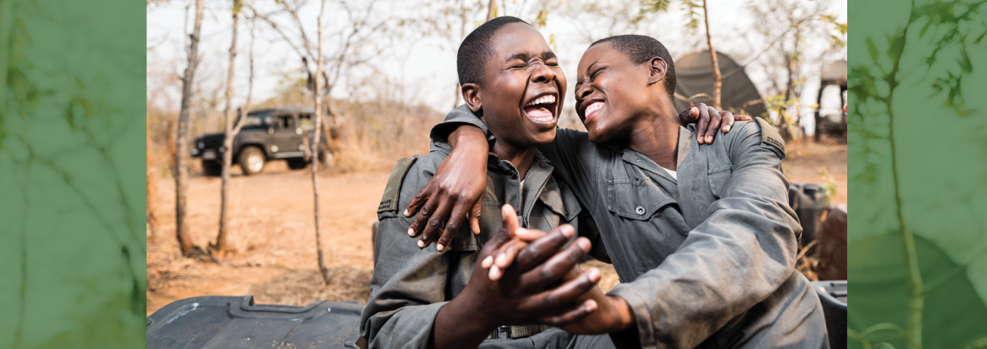 Sergeant Nyaradzo Auxilia Hoto: Protecting Africa’s Wilderness, with a Powerful All-Female Ranger Force Image - two people outdoors