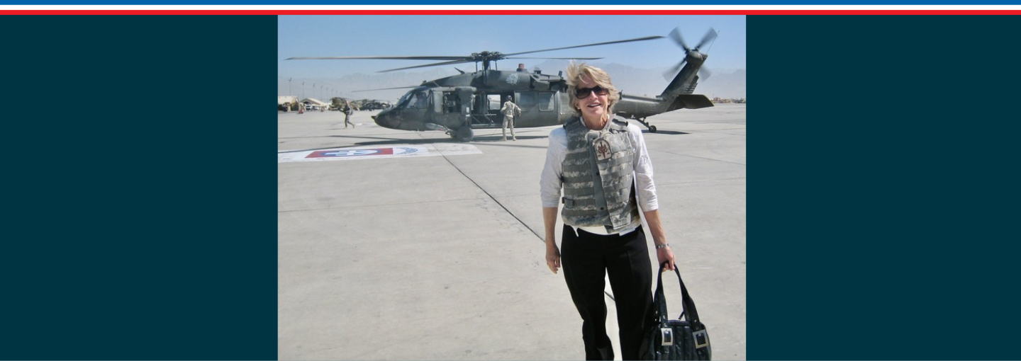 Image - the speaker with military helicopter in background