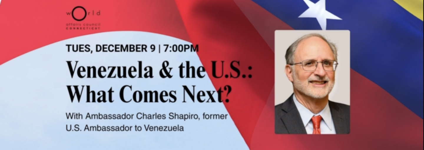 Image - the speaker and program title and detail of U.S. flag