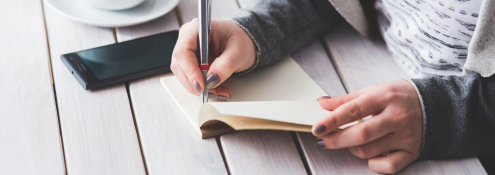 Image - woman writing in book