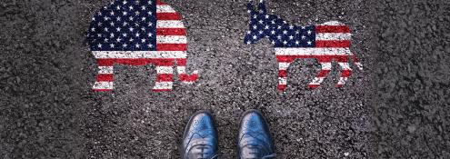 Image - painting of GOP and Democratic symbols, with person's shoes between them