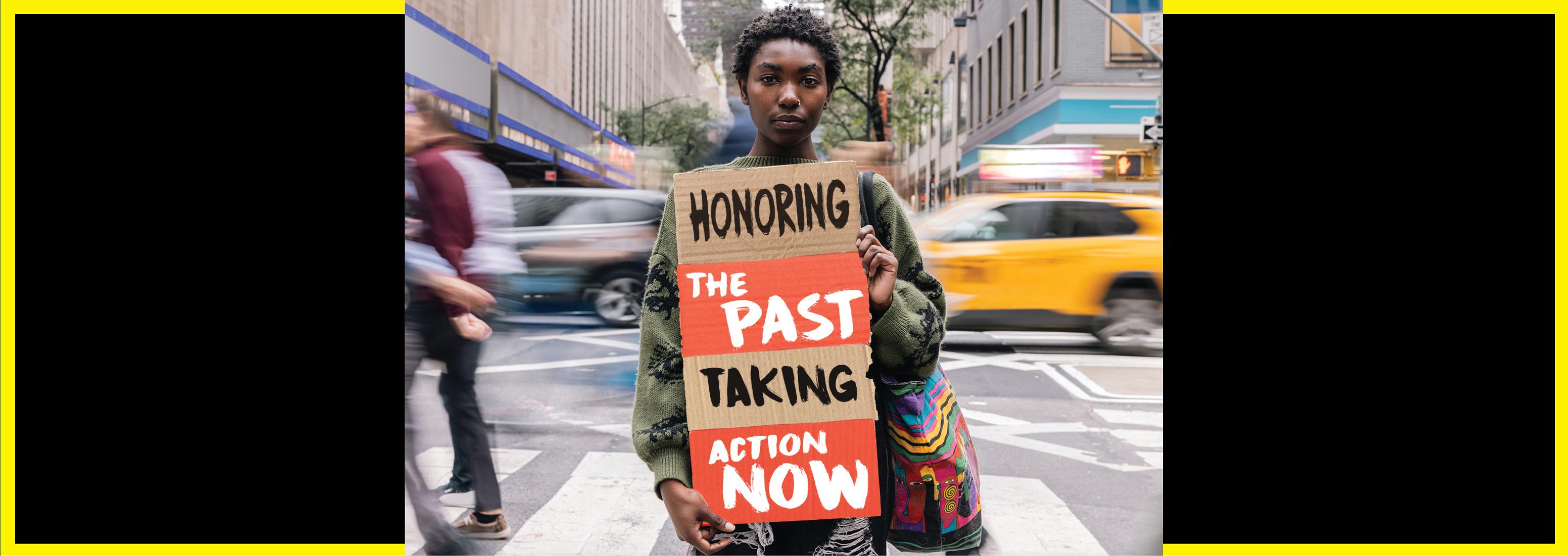 Image - woman holding sign