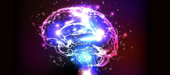 Image - illustration of human brain bathed in multi-colored lights
