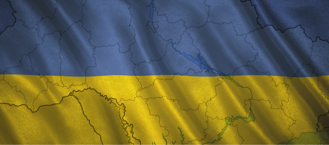 Image - outline of Ukraine against backdrop of Ukrainian flag colors