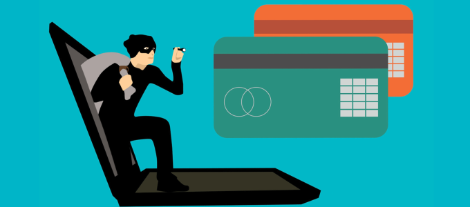 Image - illustration of criminal climbing out of laptop computer