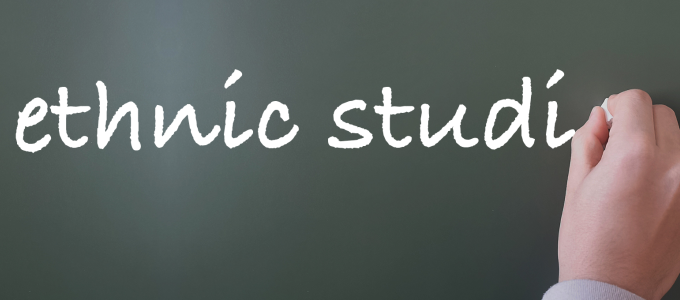 Image - hand on chalkboard and text
