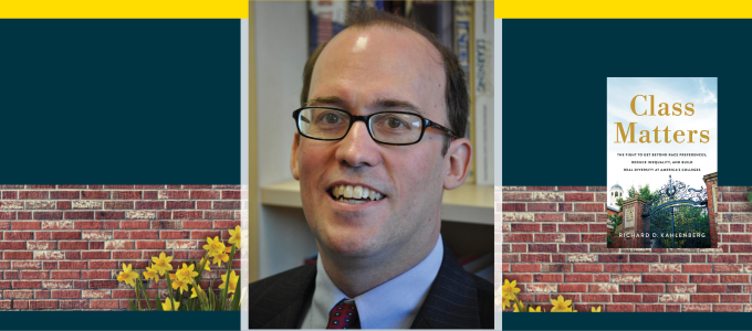 Image - the speaker, his book cover, and a brick wall