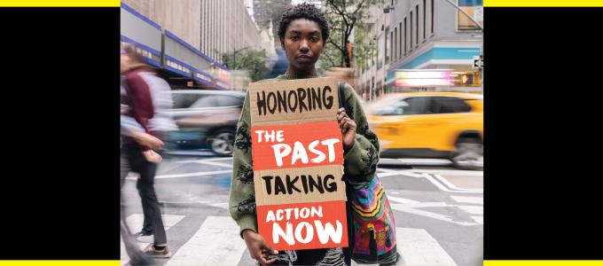 Image - woman holding sign