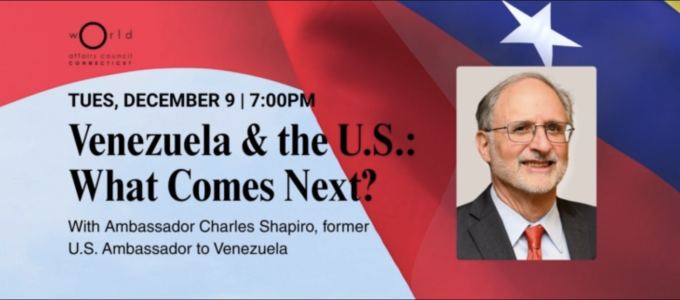 Image - the speaker and program title and detail of U.S. flag