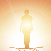 Image - figure walking into light