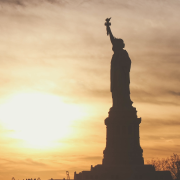 Immigrant Day of Visibility Image - the Statue of LIberty at sunset