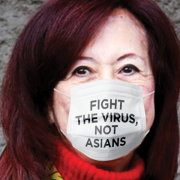 Halting Bigotry in Its Tracks Image - woman wearing mask
