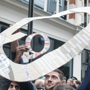 QAnon: What Happens Now? Image - protestor holding sign