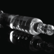 COVID-19 Vaccines and Returning to Normalcy Image - vaccine syringe