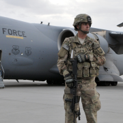 Image - U.S. soldier in front of Air Force plane in Afghanistan