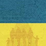 Image - people against backdrop of Ukraine flag