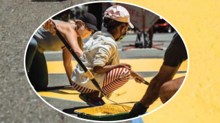 Image - girl painting the street