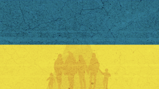 Image - people against backdrop of Ukraine flag