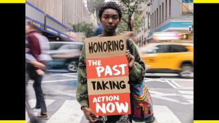 Image - woman holding sign