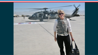 Image - the speaker with military helicopter in background